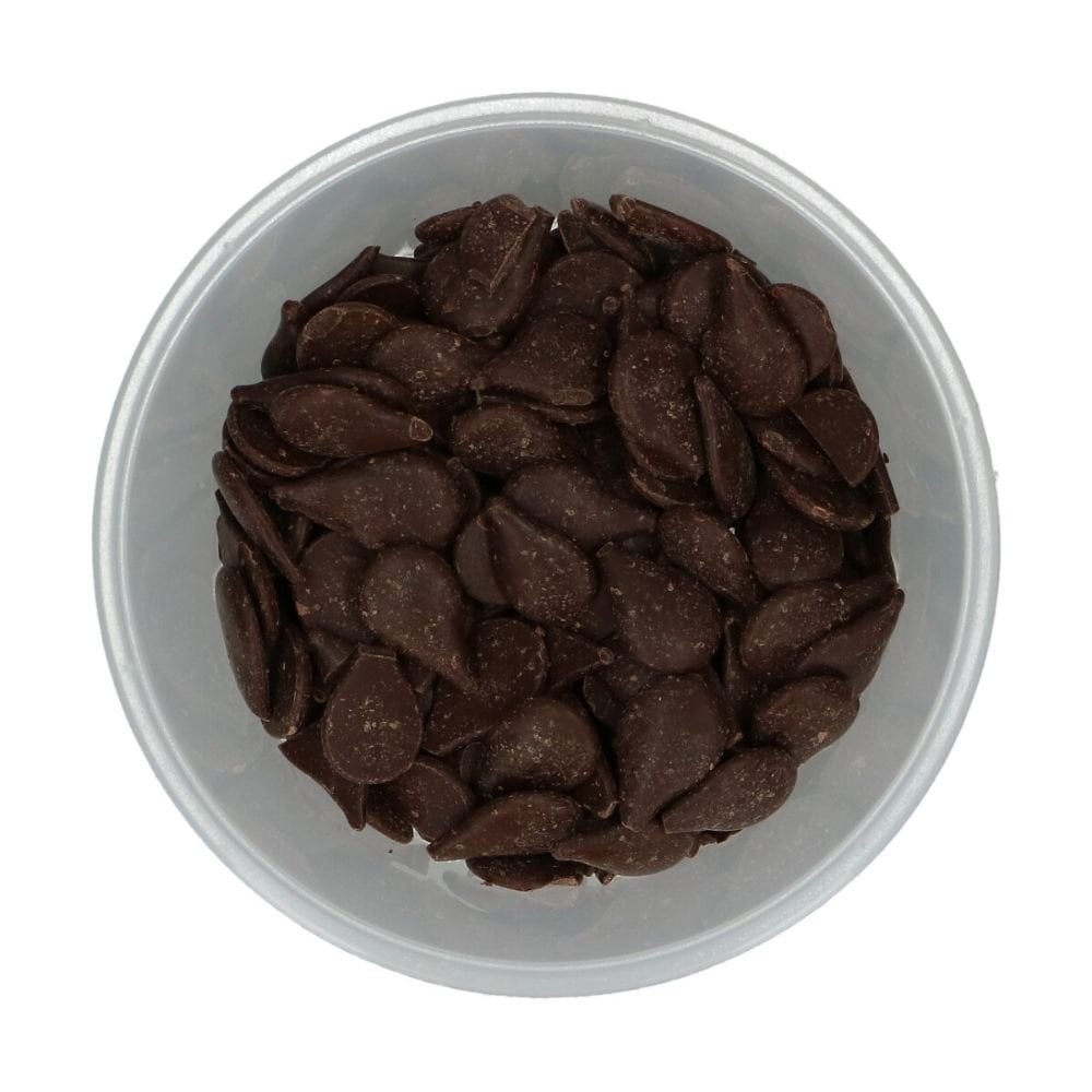 Clear plastic container filled with Wilton dark chocolate candy melts on a white background