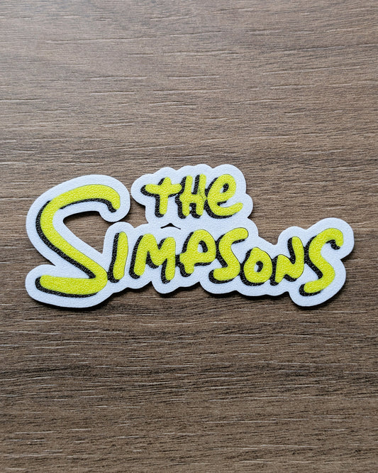 The Simpsons Sign Cake Charm