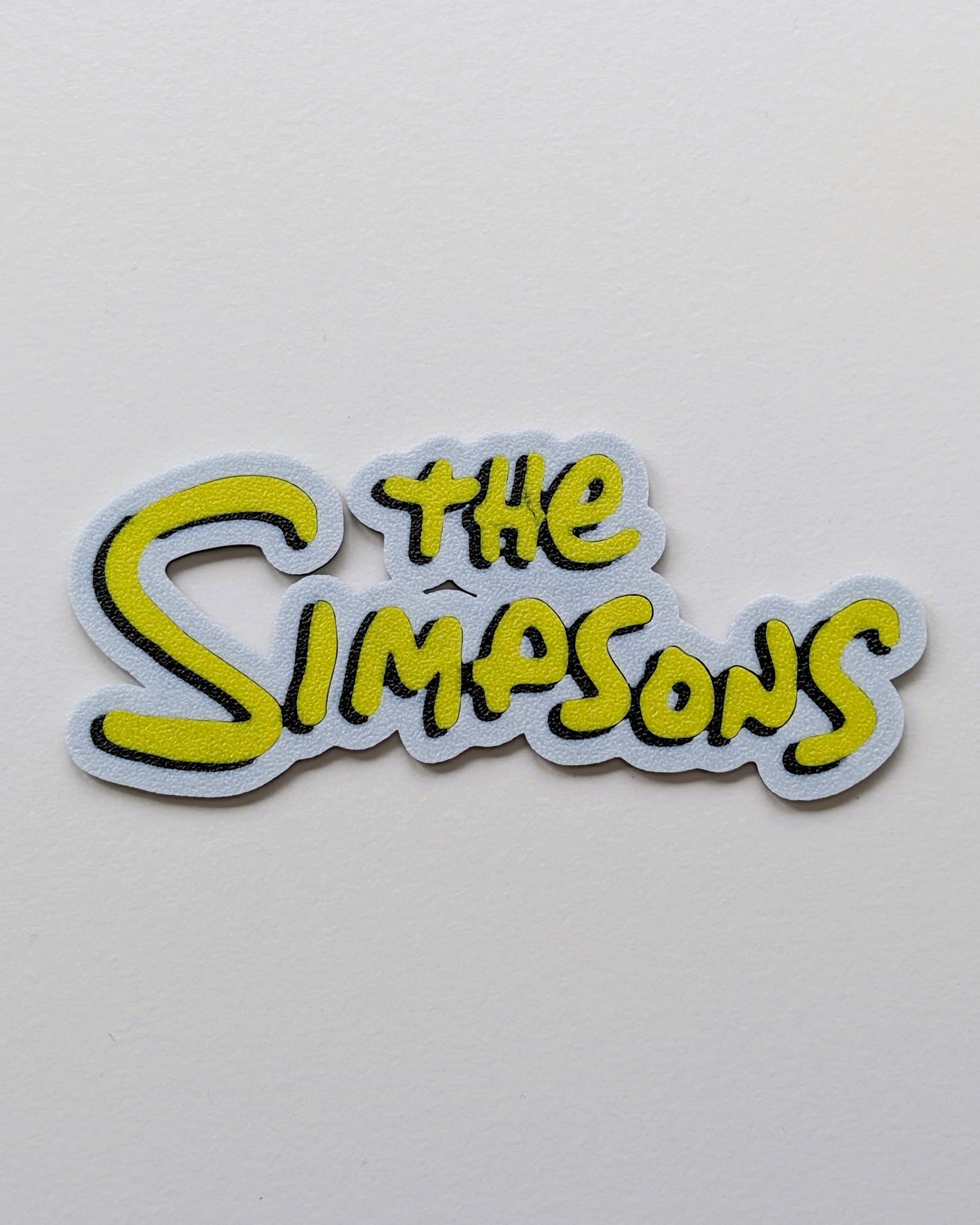 The Simpsons Sign Cake Charm