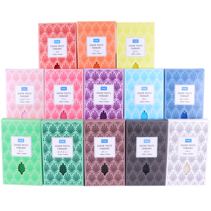 Collection of PMe coloured sugar paste on a white background